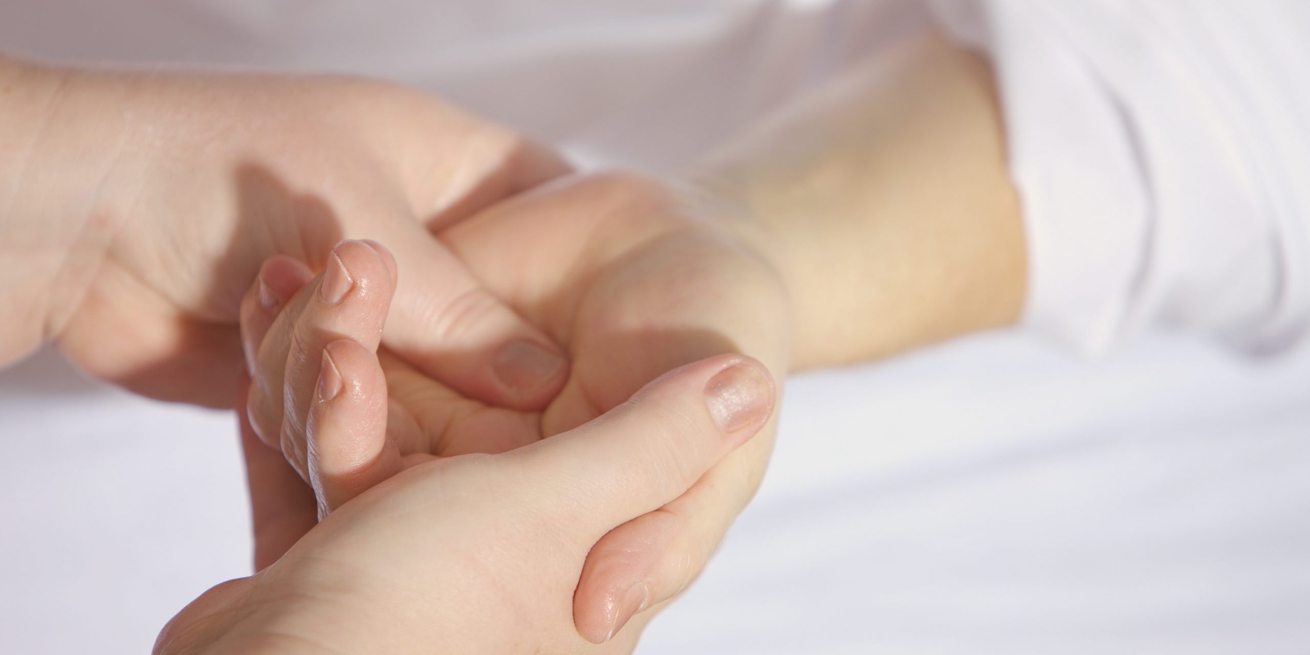 person-holding-hand-161477